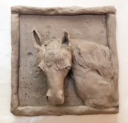 unpainted clay horse made in Cambridge